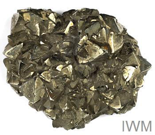 圖十一 戰俘F B Taffs在礦坑工作時，將這塊銅礦藏在屁股裡偷運出來。（© IWM EPH 199，英國戰爭博物館Imperial War Museums）